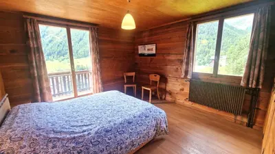 Ein Bett oder Betten in einem Zimmer der Unterkunft Beau Sejour 3- Appartement 6 personnes- Evolene