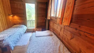 Ein Bett oder Betten in einem Zimmer der Unterkunft Beau Sejour 3- Appartement 6 personnes- Evolene