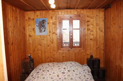 Ein Bett oder Betten in einem Zimmer der Unterkunft Le Tsenevire - appartement 4 personnes - Evolene