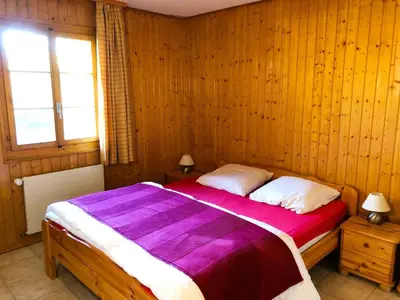 Ein Bett oder Betten in einem Zimmer der Unterkunft Bel Alp 3 - Rez avec jardin - 5 personnes- Evolene