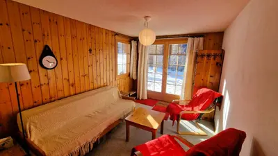 Ein Sitzbereich in der Unterkunft Pra Charris - La Forclaz - Appartement
