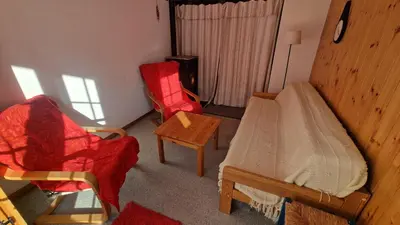 Ein Sitzbereich in der Unterkunft Pra Charris - La Forclaz - Appartement