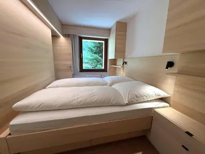 Ein Bett oder Betten in einem Zimmer der Unterkunft Sandrina 101