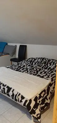 Ein Bett oder Betten in einem Zimmer der Unterkunft Studio Vissoie