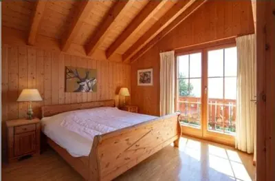Ein Bett oder Betten in einem Zimmer der Unterkunft Quiet cottage with extraordinary view