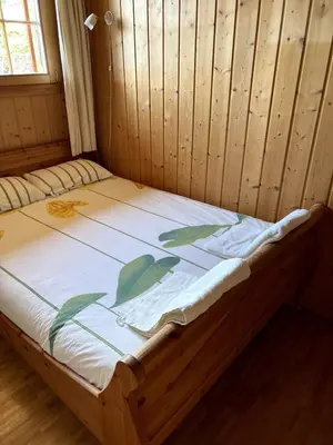 Ein Bett oder Betten in einem Zimmer der Unterkunft Quiet cottage with extraordinary view