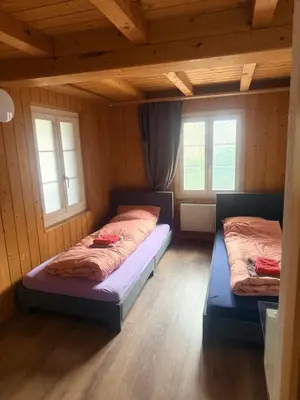 Ein Bett oder Betten in einem Zimmer der Unterkunft Appartment Happy Life - Wimmis - near Spiez-Thun- Interlaken