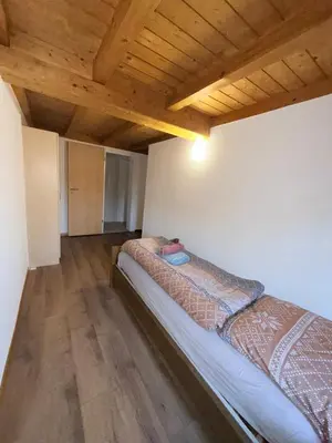 Ein Bett oder Betten in einem Zimmer der Unterkunft Appartment Happy Life - Wimmis - near Spiez-Thun- Interlaken