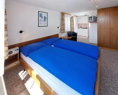 Ein Bett oder Betten in einem Zimmer der Unterkunft Hotel zum See