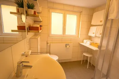 Ein Badezimmer in der Unterkunft Chalet Alpenheim 2 OG
