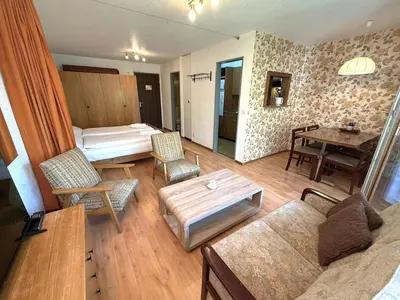 Ein Bett oder Betten in einem Zimmer der Unterkunft Royal 33