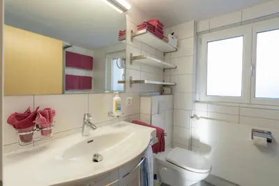 Ein Badezimmer in der Unterkunft Chalet Alpenheim 1 OG