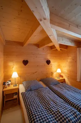 Ein Bett oder Betten in einem Zimmer der Unterkunft Chalet Dax