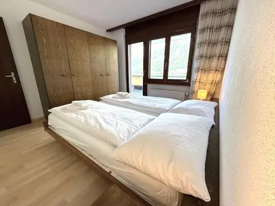 Ein Bett oder Betten in einem Zimmer der Unterkunft Royal 51
