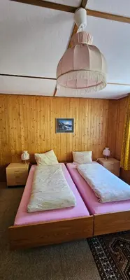 Ein Bett oder Betten in einem Zimmer der Unterkunft The Saxeten at alps