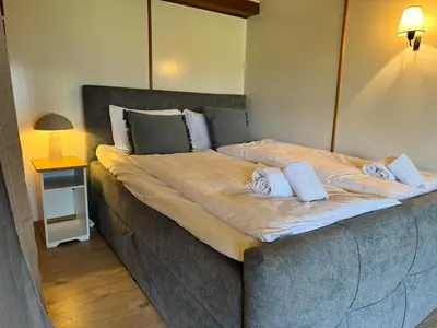 Ein Bett oder Betten in einem Zimmer der Unterkunft River 1 - Retreat with Iconic Jungfraujoch View