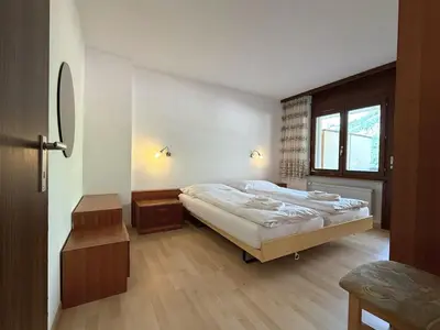 Ein Bett oder Betten in einem Zimmer der Unterkunft Royal 52