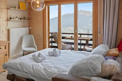 Ein Bett oder Betten in einem Zimmer der Unterkunft Thyon-les-Collons, 4 pers - Balcon avec vue
