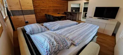 Ein Bett oder Betten in einem Zimmer der Unterkunft Chalet Bernadette