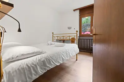 Ein Bett oder Betten in einem Zimmer der Unterkunft Crans-Montana, 6 pers - parking privé & PMR