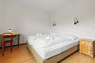 Ein Bett oder Betten in einem Zimmer der Unterkunft Crans-Montana, 6 pers - parking privé & PMR