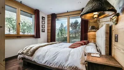 Ein Bett oder Betten in einem Zimmer der Unterkunft CHALET MOUTON a 4-Bedroom Alpine Chic Escape in Saas-Fee