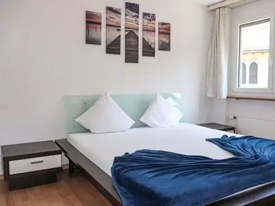 Ein Bett oder Betten in einem Zimmer der Unterkunft Apartment Rubin by Interhome