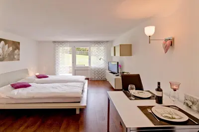 Ein Bett oder Betten in einem Zimmer der Unterkunft Ferienwohnung Bahari Zermatt