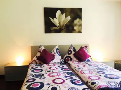 Ein Bett oder Betten in einem Zimmer der Unterkunft Ferienwohnung Bahari Zermatt