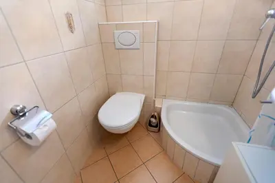Ein Badezimmer in der Unterkunft Zermatt, 4 pers, 3 lits - Balcon avec vue et petit jardin