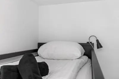 Ein Bett oder Betten in einem Zimmer der Unterkunft Zermatt, 4 pers, 3 lits - Balcon avec vue et petit jardin