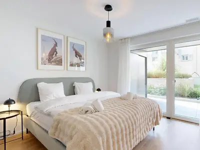 Ein Bett oder Betten in einem Zimmer der Unterkunft Bright flat with terrace in Sierre