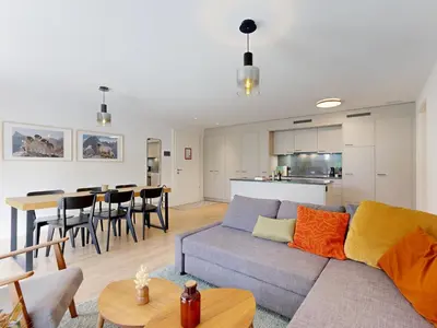 Ein Sitzbereich in der Unterkunft Bright flat with terrace in Sierre