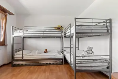 Ein Bett oder Betten in einem Zimmer der Unterkunft Crans-Montana - 6 pers - 5 lits - 2 parkings