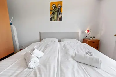 Ein Bett oder Betten in einem Zimmer der Unterkunft Crans-Montana - 6 pers - 5 lits - 2 parkings