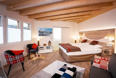 Ein Bett oder Betten in einem Zimmer der Unterkunft Modernes Loft an Top-Lage by ZermattStays