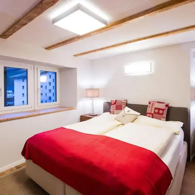 Ein Bett oder Betten in einem Zimmer der Unterkunft Gemütliches Chalet, 2 Min vom Kirchplatz by ZermattStays