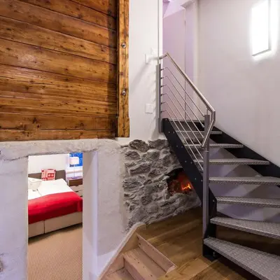 Ein Bett oder Betten in einem Zimmer der Unterkunft Gemütliches Chalet, 2 Min vom Kirchplatz by ZermattStays