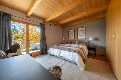 Ein Bett oder Betten in einem Zimmer der Unterkunft Chalet Occursus Anzère