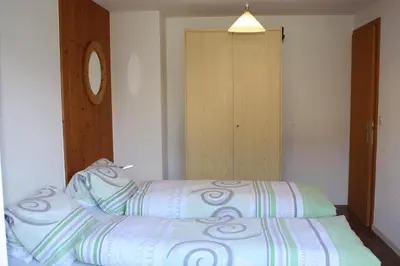 Ein Bett oder Betten in einem Zimmer der Unterkunft Chalet Gerbera 2