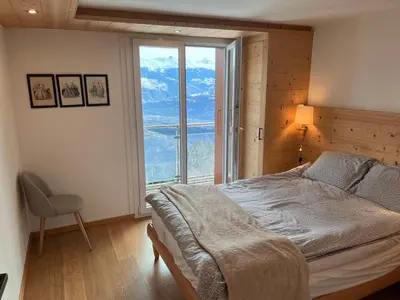 Ein Bett oder Betten in einem Zimmer der Unterkunft Chalet les jouges