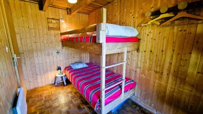 Ein Bett oder Betten in einem Zimmer der Unterkunft Chalet l Houtot
