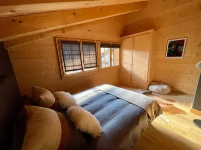 Ein Bett oder Betten in einem Zimmer der Unterkunft Charming Chalet With Splendid Views Near Gstaad