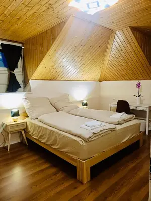 Ein Bett oder Betten in einem Zimmer der Unterkunft La Petite Maline friends & family