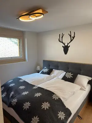 Ein Bett oder Betten in einem Zimmer der Unterkunft White Flake