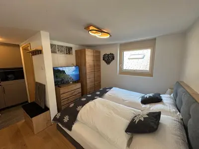 Ein Bett oder Betten in einem Zimmer der Unterkunft White Flake