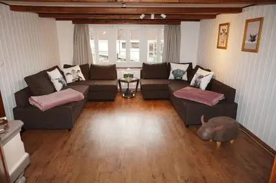 Ein Sitzbereich in der Unterkunft Lovely idyllic apartment close to the Lake