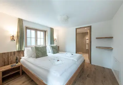 Ein Bett oder Betten in einem Zimmer der Unterkunft Chalet Ledihus Garden Apartment