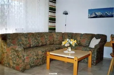 Ein Sitzbereich in der Unterkunft Apartment Haus Nesthorn - 2 Gäste