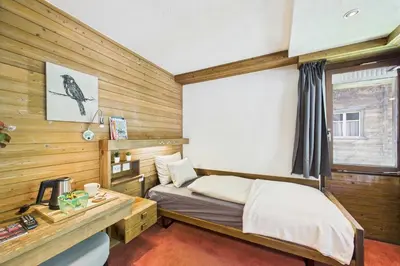 Ein Bett oder Betten in einem Zimmer der Unterkunft Cozy Single Suite in the Heart of Saas-Fee